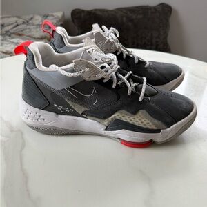 Nike Black and Gray Sneakers with Red Highlights